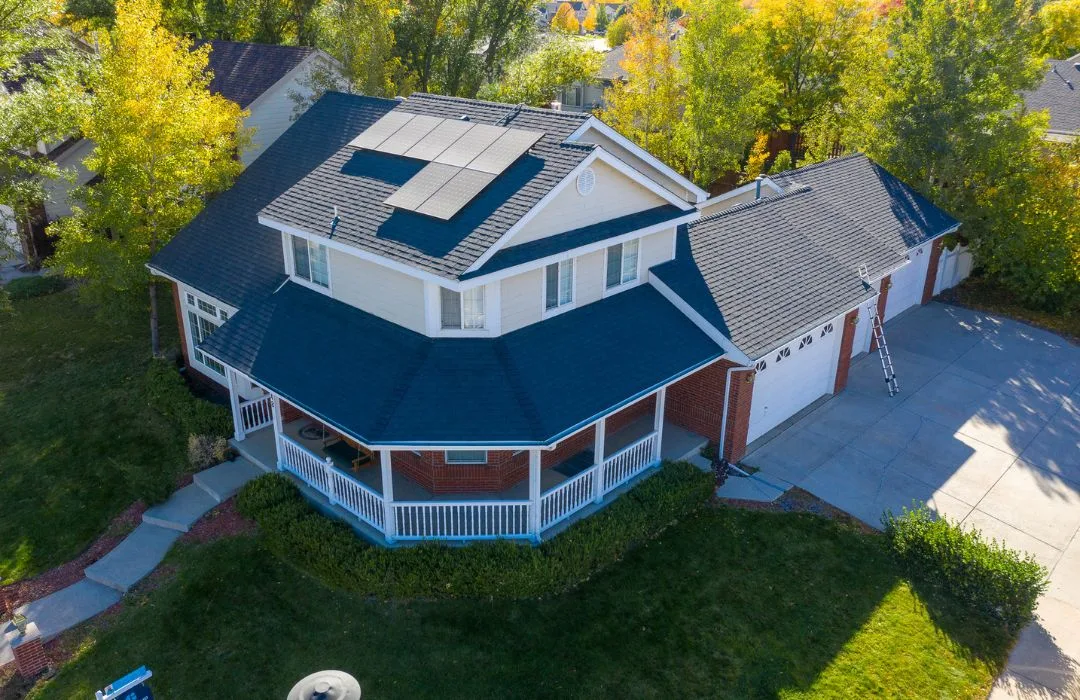 Aerial view of a house with a new roof